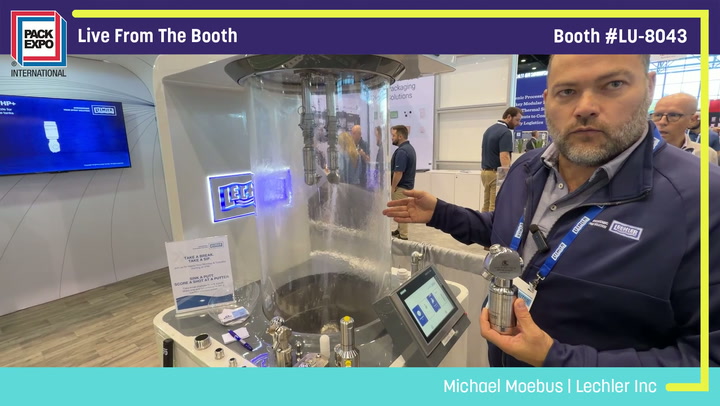 Michael Moebus from Lechler Inc demonstrates packaging equipment at Pack Expo booth LU-8043