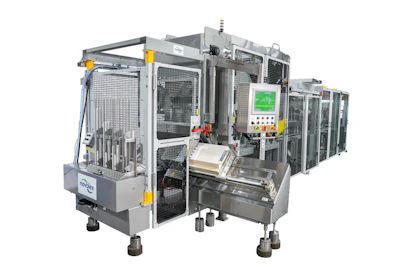 Industrial automated assembly machine with white frame, control panel, and safety guards for manufacturing operations